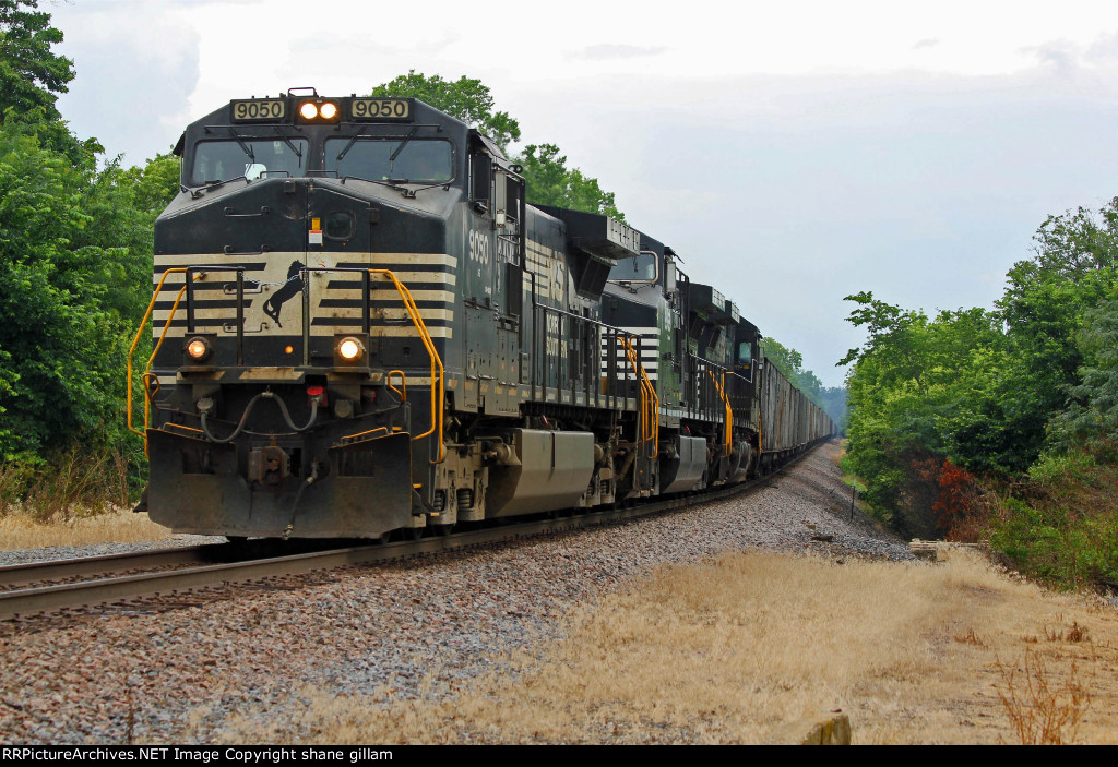 NS 9050 Heads a SB empty coal train toward the mine.